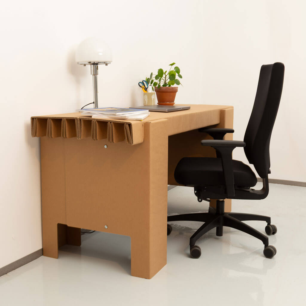 RIAB GRID table single, 64 cm in natural cardboard used as desk