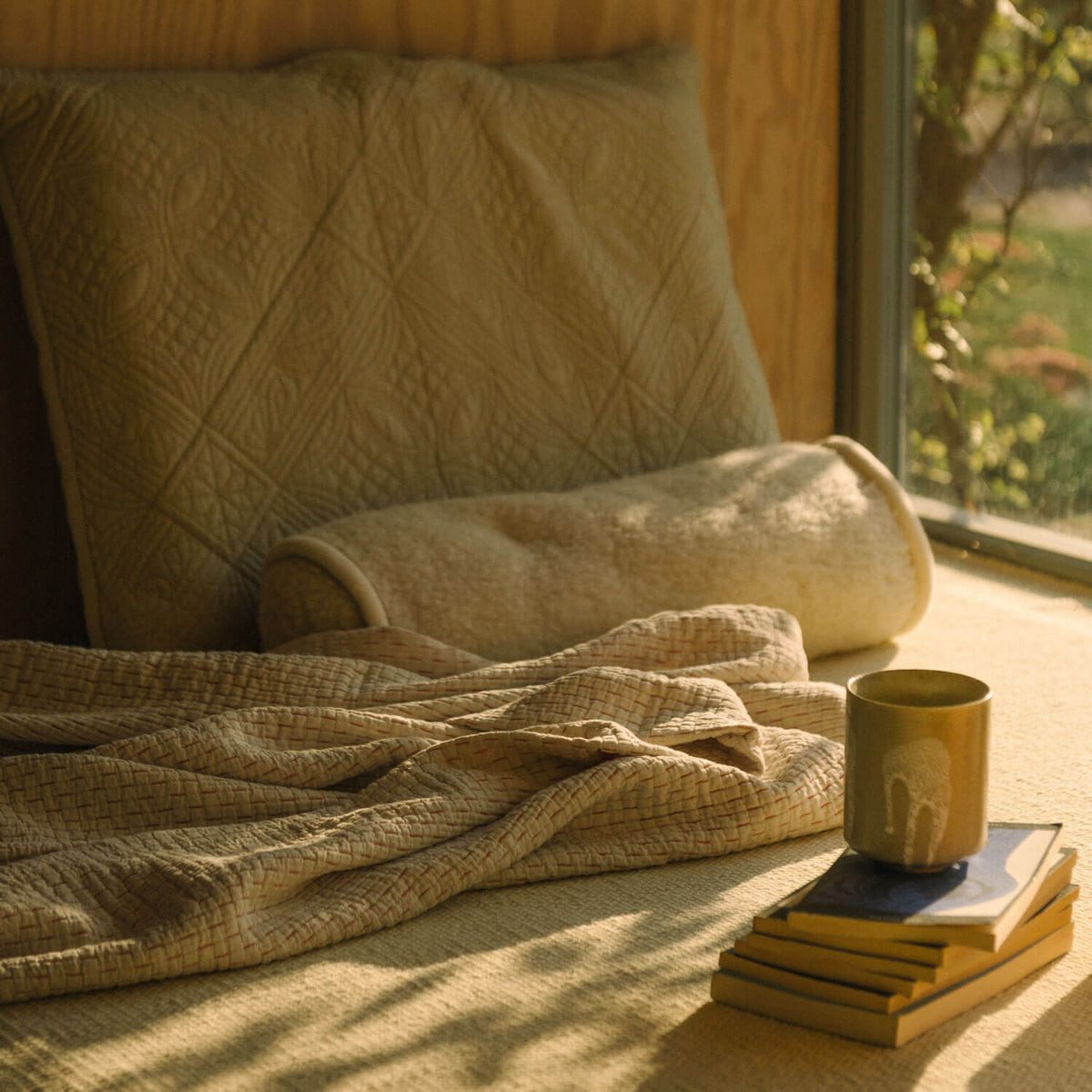 ROOM IN A BOX bedspread with coffee and books
