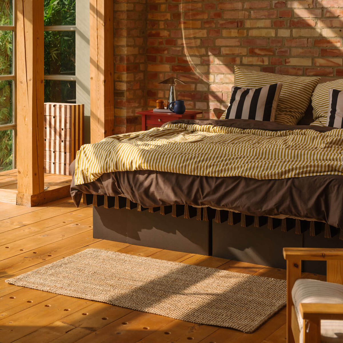 ROOM IN A BOX grid storage bed black with yellow bed linen