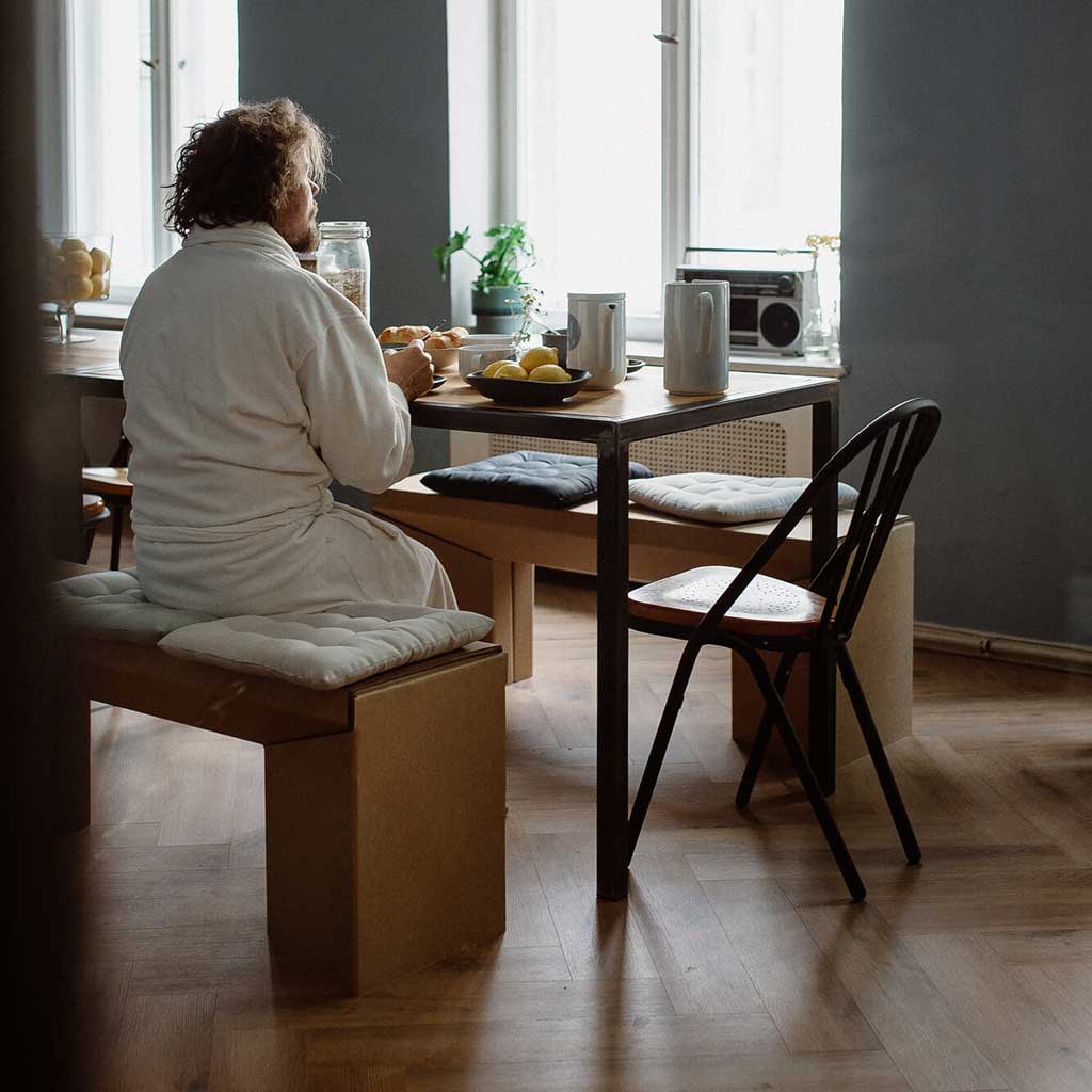 sustainable cardboard bench in dining area