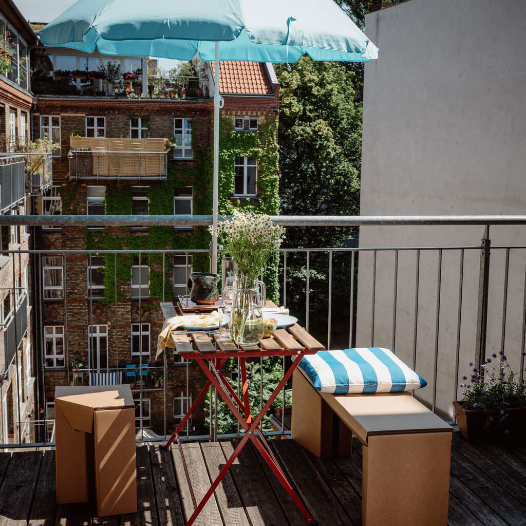 sustainable cardboard bench on balcony