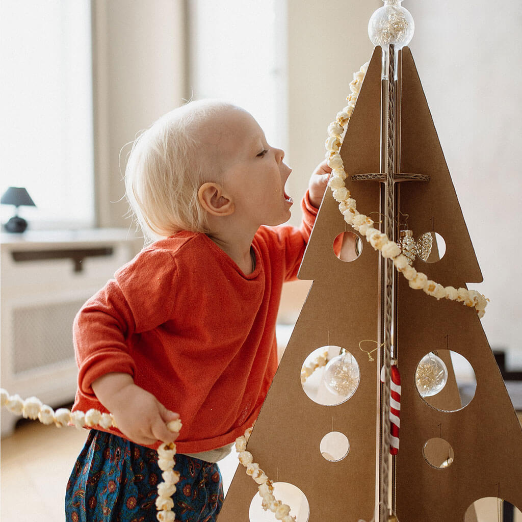 ROOM IN A BOX - Zero Waste Christmas Tree made from sustainable cardboard with child decorated